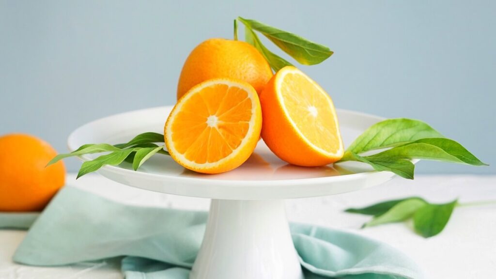 Como plantar laranja: Veja 7 dicas incríveis para cultivar frutas deliciosas! 2 Laranja cortada