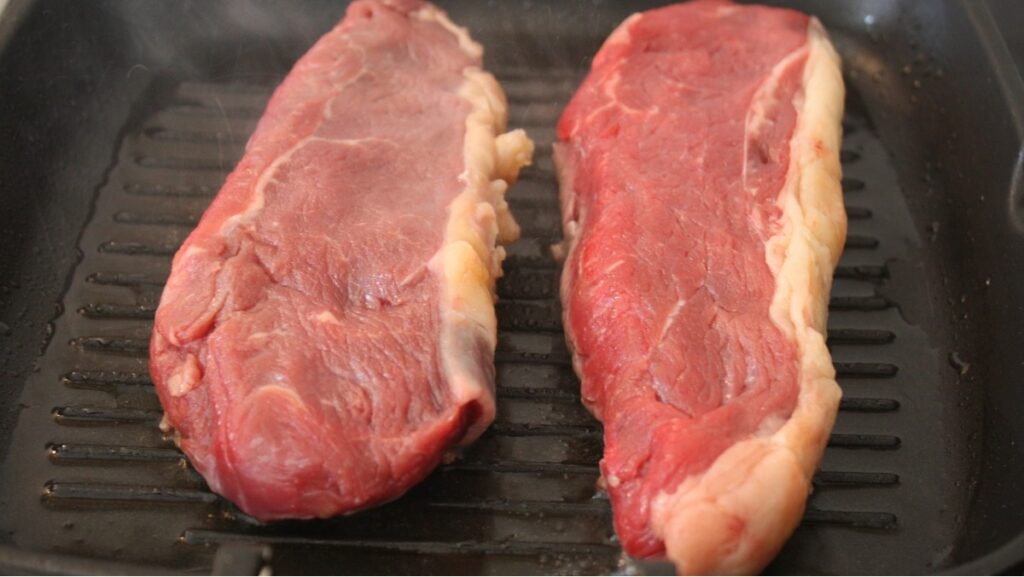 Sonhar com carne assada