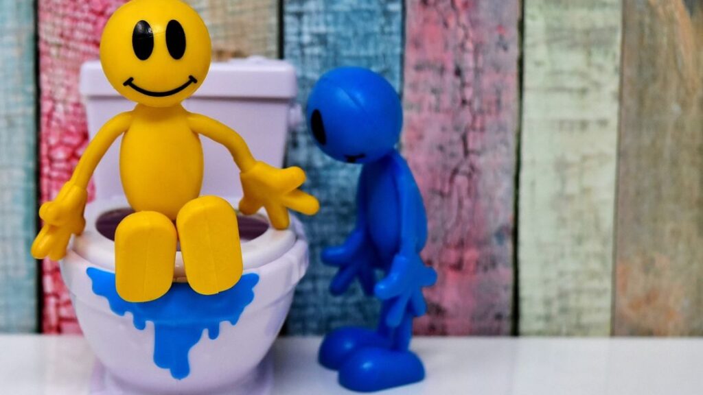 Como limpar vaso sanitário encardido: Guia de limpeza! 2 Desenho ilustrando um vaso sanitário e dois bonecos.
