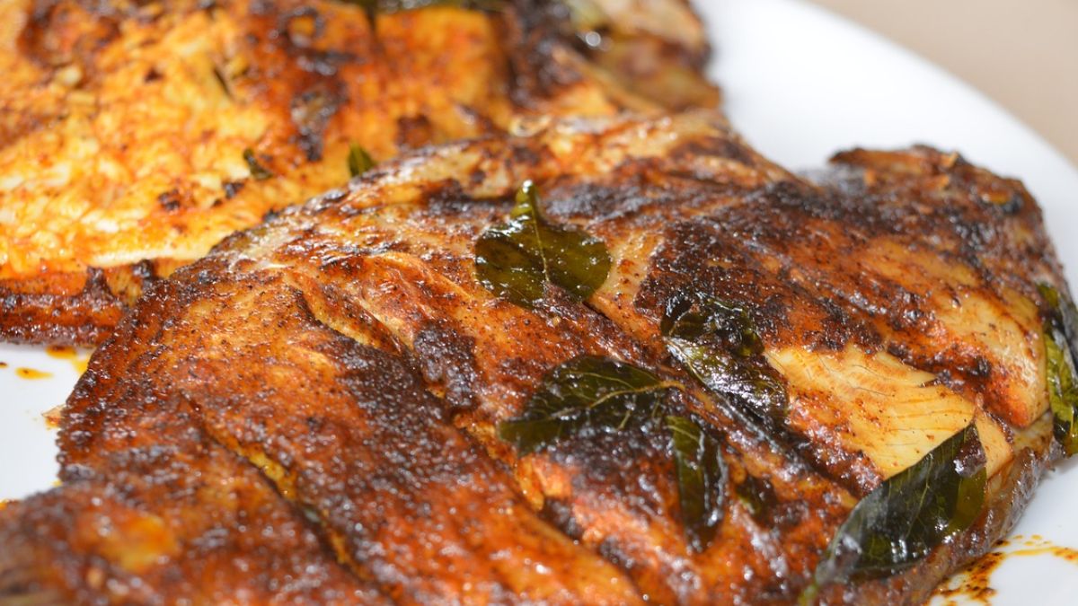 Desvendando o Significado: Sonhar comendo peixe frito!