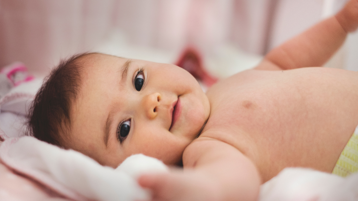 Bebê deitadinho em sua cama