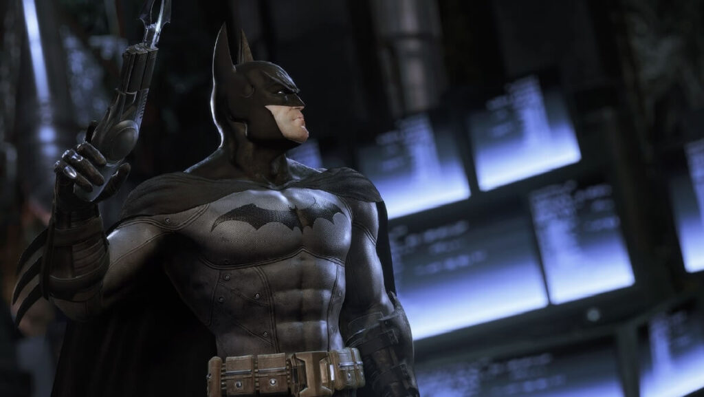 Imagem do jogo mostrando o personagem do Batman com uma arma nas mãos.